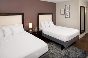 Llit o llits en una habitació de The Andrew Hotel