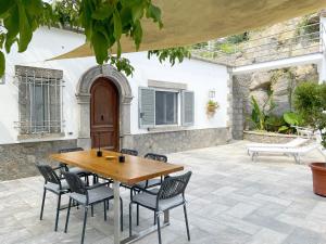 A patio or other outdoor area at Rock House Villa