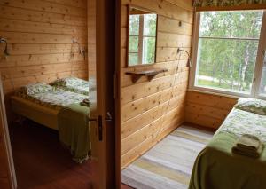 Postel nebo postele na pokoji v ubytování Hotel Korpikartano + 37 fotografií