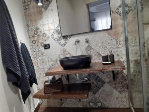 TV a/nebo společenská místnost v ubytování Borgo Fontana B&B