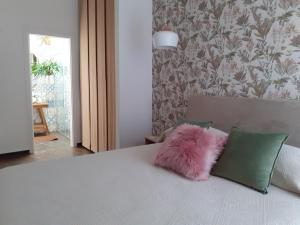 Postel nebo postele na pokoji v ubytování Borgo Fontana B&B