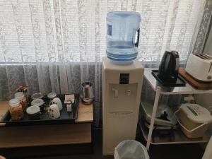 a jug of water on top of a refrigerator at Telperio - Guest suite max 4 Guests in Bunbury