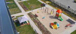 an overhead view of a play park with a playground at Vika in Kołobrzeg