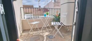 A balcony or terrace at Malaga a Tu Ritmo! Edificio muy tranquilo y moderno!
