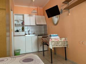 Kuchyňa alebo kuchynka v ubytovaní Alexandras Appartments