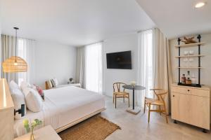 TV a/nebo společenská místnost v ubytování Hotel Greystone - Adults Only