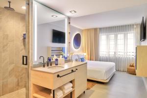 TV a/nebo společenská místnost v ubytování Hotel Greystone - Adults Only