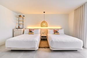 Postel nebo postele na pokoji v ubytování Hotel Greystone - Adults Only