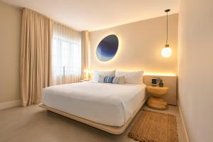 Postel nebo postele na pokoji v ubytování Hotel Greystone - Adults Only