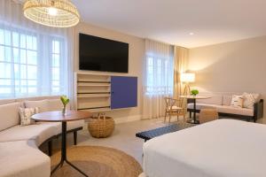 TV a/nebo společenská místnost v ubytování Hotel Greystone - Adults Only + 31 fotografií