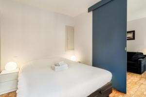 Ein Bett oder Betten in einem Zimmer der Unterkunft Apart of Paris - Chatelet - Rue de Rivoli