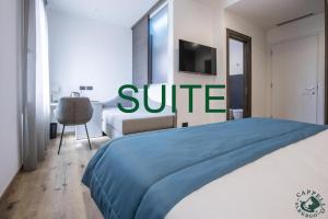 Giường trong phòng chung tại Albergo Cappello e Cadore