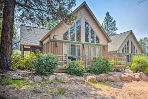 a house with a large window on the front of it at Klamath Falls Family Cottage Hike and Explore! in Klamath Falls