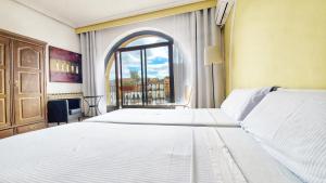Fotografia z galérie ubytovania Hostal Martes Cáceres Plaza Mayor - Tercer piso SIN ascensor v destinácii Cáceres