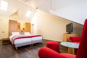 TV a/nebo společenská místnost v ubytování Hotel Seeburg