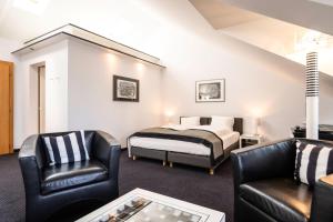 Postel nebo postele na pokoji v ubytování Hotel Seeburg + 37 fotografií