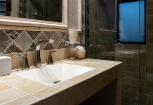 a bathroom with a sink and a shower at Casa Maricela B&B in San Miguel de Allende +158 photos
