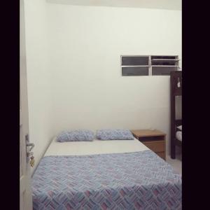 Ένα ή περισσότερα κρεβάτια σε δωμάτιο στο Hostel Central