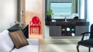 Posezení v ubytování Essenza Hotel