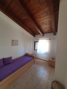 A bed or beds in a room at Gabbiano Jonathan