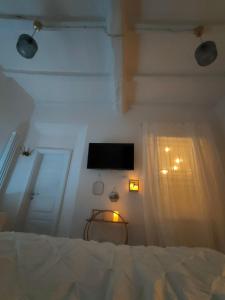 En eller flere senge i et værelse på Il Sitarein