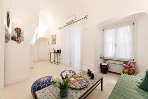 Zona de estar de Qasar Luxury Suite - in Capri's Piazzetta
