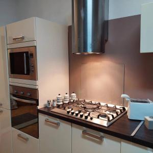 Kuchyňa alebo kuchynka v ubytovaní Apartment Rome 18