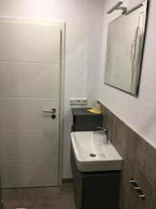 Ένα μπάνιο στο Modernes 21 m² Apartment ruhig, modern, zentral