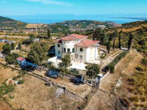 an aerial view of a house on a hill at Domus Mare Cilento in Agropoli
