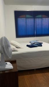 Voodi või voodid majutusasutuse Hostel Assis Divinópolis toas
