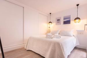 Posteľ alebo postele v izbe v ubytovaní Unika homes Juan Rabadán