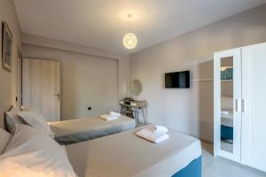 Postel nebo postele na pokoji v ubytování Villa Vasiliki