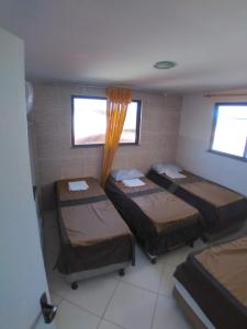 Postel nebo postele na pokoji v ubytování Brasil mulato