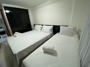 Israel Flat Tambaú tesisinde bir odada yatak veya yataklar