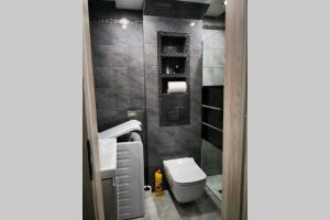 Kúpeľňa v ubytovaní Apartament dwuosobowy