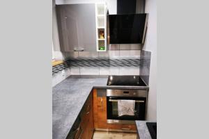 Kuchyňa alebo kuchynka v ubytovaní Apartament dwuosobowy