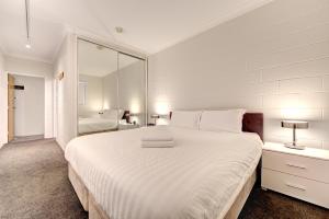 Postel nebo postele na pokoji v ubytování Snow Ski Apartments Extra Spacious 36