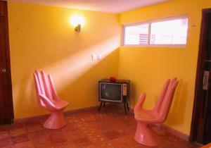 A television and/or entertainment center at Hotel Maria Guadalupe