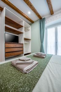 A bed or beds in a room at Elegant Suite in Milan Center