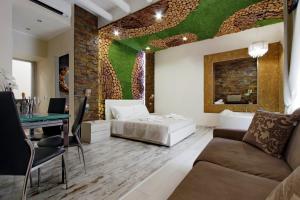 Кровать или кровати в номере Suite Paradise Rome Guest Rooms