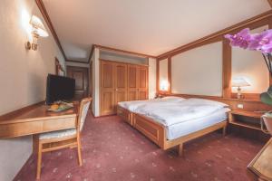 Postel nebo postele na pokoji v ubytování Antares Hotel