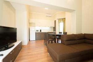 A television and/or entertainment centre at Holiday Village Lozenets