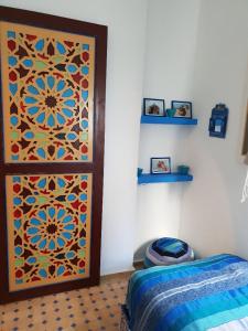 En eller flere senge i et værelse på Rychance Kasbah