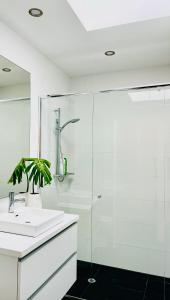 a bathroom with a sink and a shower at 734 apartment-2 bedroom and 2 bathroom accommodation, sleeps 4 in Margaret River Town