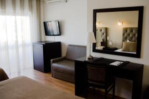 TV a/nebo společenská místnost v ubytování Hotel Paiva