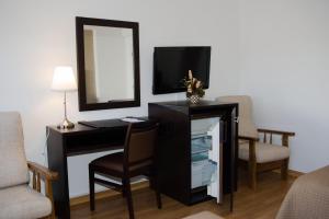 TV a/nebo společenská místnost v ubytování Hotel Paiva