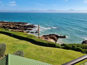 a view of the ocean from a house at Point Village Accommodation - Erin 5 in Mossel Bay