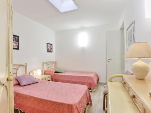 Posteľ alebo postele v izbe v ubytovaní Holiday Home Red Stones by Interhome