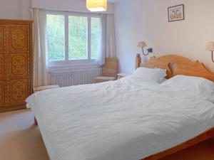 Katil atau katil-katil dalam bilik di Apartment Les Cimes by Interhome