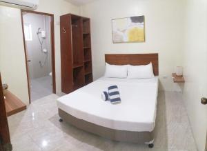 Postel nebo postele na pokoji v ubytování Acapulco Resort